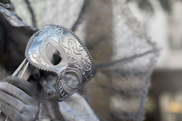 Silver venetian mask: When we feel unsafe and unseen, we hide behind a mask.